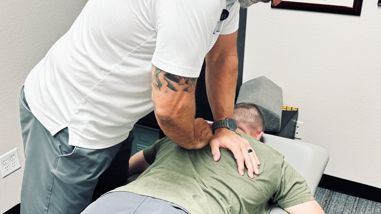 Fort Worth sports chiropractor performing a chiropractic adjustment on a patient at Taylor Made Integrative Therapy