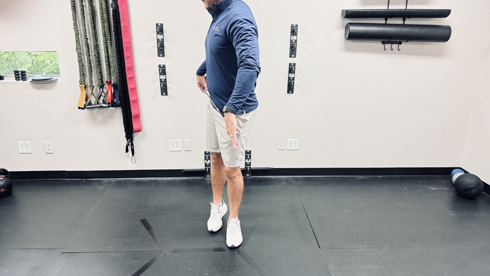 Lower-quarter rotation screen assessing hip and pelvis rotation for the golf swing at a Fort Worth sports chiropractic clinic